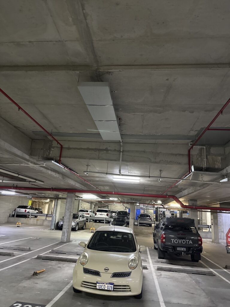 Drip trays fitted beneath overhead services to protect vehicles below