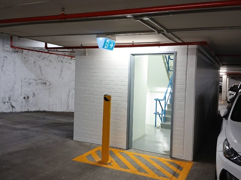 Car park lift lobby entry with new yellow line marking and repainted walls