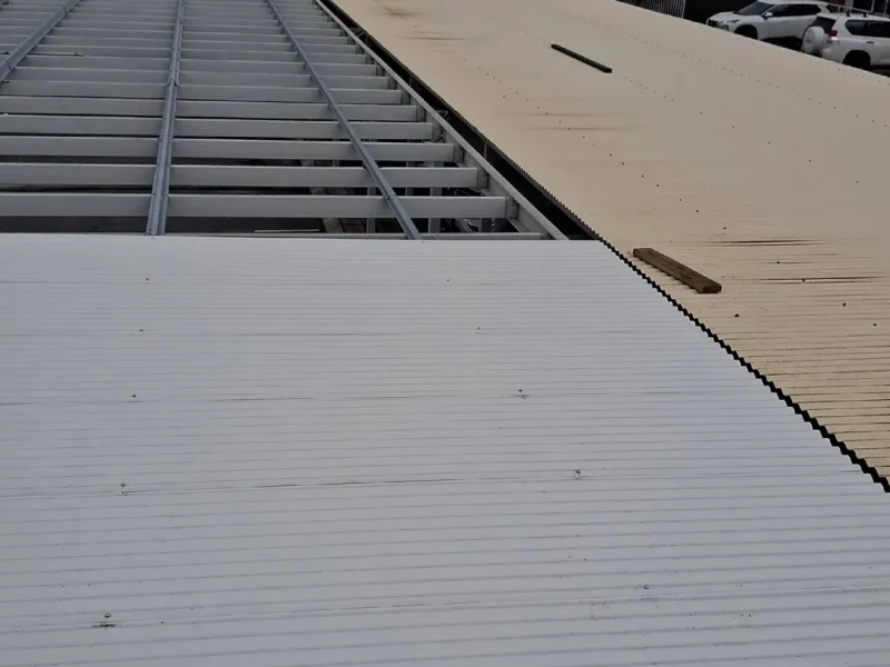carpark-roof-resheeting-in-progress.webp