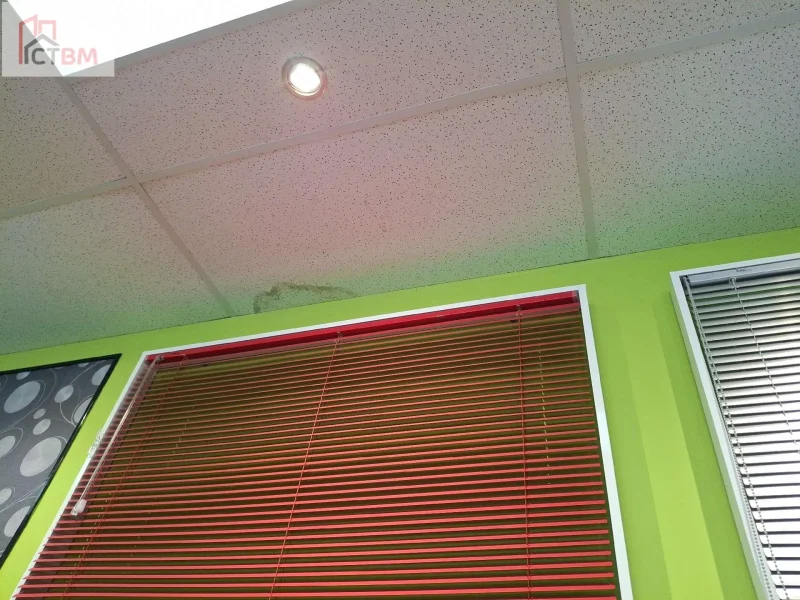 Ceiling corner and lighting after ceiling tile replacement