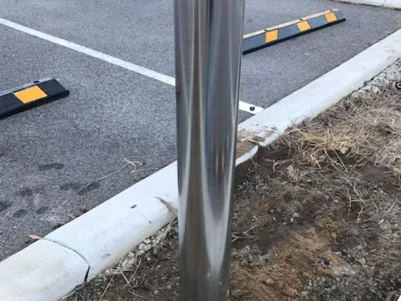 ctbm-stainless-bollard-installed-next-to-kerb.webp